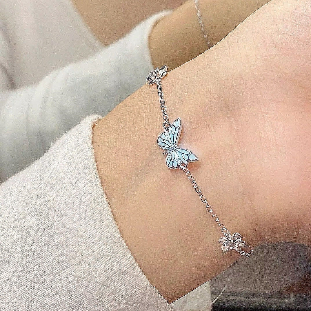 Butterfly bracelet on the wrist in daylight